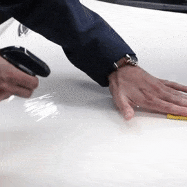how to clay bar a car wiping on white hood