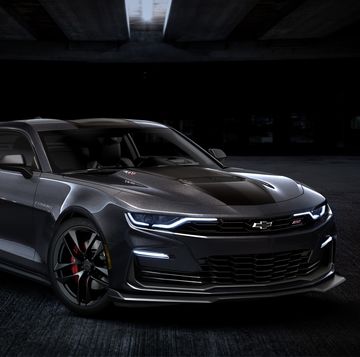 front 34 view of 2024 chevrolet camaro ss collector’s edition in panther black metallic tintcoat preproduction model shown actual production model may vary available late summer 2023