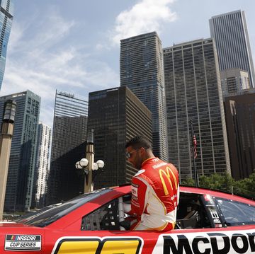 chicago, illinois july 19 bubba wallace gets into his car before driving around downtown chicago in promotion of the nascar chicago street race announcement on july 19, 2022 in chicago, illinois photo by patrick mcdermottgetty images